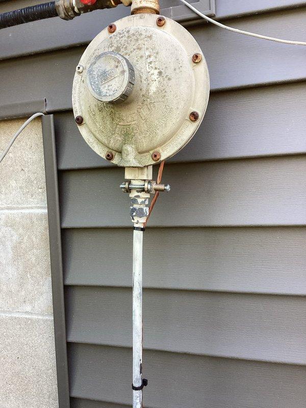 Completed bonding installation for CSST gas piping system to meet electrical code requirements. Installed 10 feet of bare #6 copper ground wire from the electrical panel to the gas line entry point, establishing proper bonding connection at the gas meter location. All work performed in accordance with NEC standards for corrugated stainless steel tubing gas line bonding requirements.