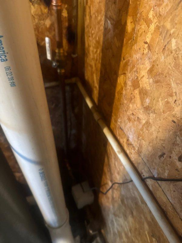 Responded to service call for suspected ductwork leak with rusty-colored water discharge in bathroom ceiling area. Upon investigation, determined leak originated from bathroom soap shelf rather than HVAC system. Applied silicone sealant around soap shelf to prevent water intrusion and replaced small damaged section of return air ductwork that had been affected by moisture exposure.