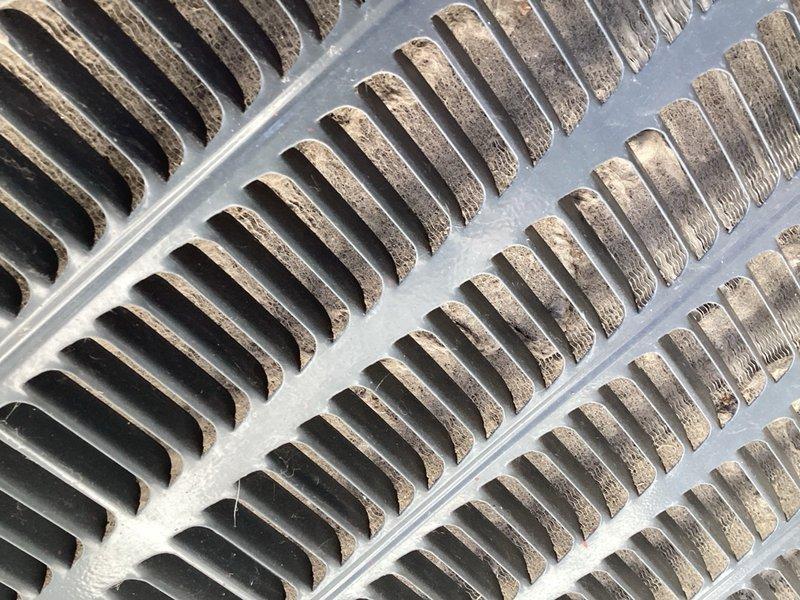 Responded to no cooling complaint and found system completely void of refrigerant. Inspected outdoor unit and observed heavily soiled evaporator coils with significant dust accumulation on heat exchanger fins. Due to total refrigerant loss, advanced age of equipment, and overall system condition, recommended customer contact project manager to discuss replacement options rather than pursue repairs.