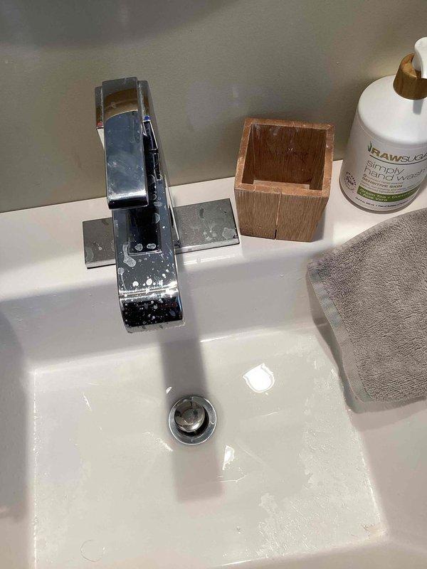 Completed comprehensive plumbing inspection for new home purchase. Identified two critical deficiencies: absence of shut-off valve on water heater and missing shut-off valve on water main after the meter. Inspected all accessible plumbing fixtures including bathroom sink with chrome faucet and standard toilet installation. Documented findings with photographs for reference. Recommended installation of both shut-off valves to meet code requirements and provide proper water control for emergency situations and future maintenance needs.