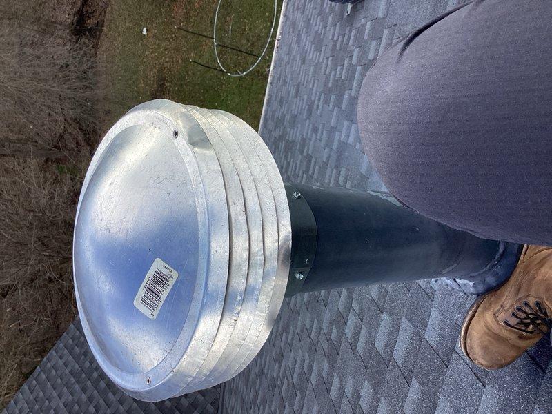 Responded to service call for furnace exhaust vent issue. Upon arrival, found the rooftop vent cap had completely detached from the exhaust termination point. Inspected the damaged component and confirmed the vent cap assembly was broken and required replacement. Documented the condition with photographs showing the separated cap and weathered vent termination. Scheduled return visit for Monday to install new vent cap and restore proper exhaust ventilation system operation.