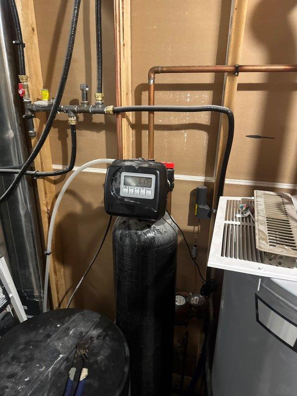 Responded to water leak complaint with unknown source. Upon inspection, identified water softener system running constantly due to failed stack gasket. Removed defective gasket, installed replacement component, and tested system to confirm proper cycling and operation. Leak resolved and system restored to normal function.