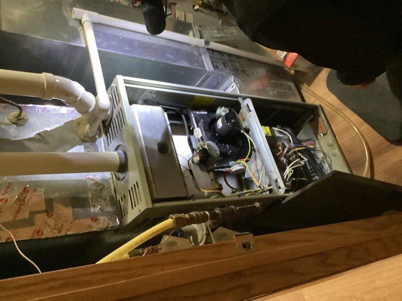 Responded to service call regarding thermostat without AC option selection. Upon arrival, performed comprehensive AC preventive maintenance inspection on attic-mounted air handler unit. Verified all system components operational, including blower motor assembly, electrical connections, and condensate drainage lines. Determined AC system functioning properly with no deficiencies found; thermostat issue resolved through user instruction or reprogramming.