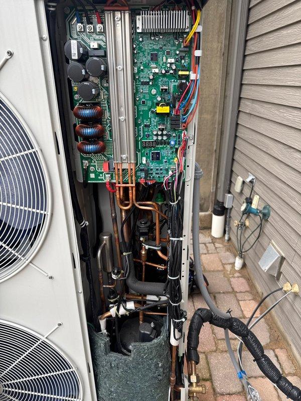 Responded to service call for heat pump system overheating home beyond thermostat setpoint with inconsistent furnace fan operation and continuous humidifier water flow. Upon arrival, diagnosed main floor zone damper failing to close completely, causing system to overheat living space particularly during nighttime hours. Inspected Honeywell programmable thermostat and reviewed scheduling settings with homeowner, who adjusted temperature programming to compensate for damper malfunction. Examined inverter-driven heat pump outdoor unit, verifying proper operation of variable-speed compressor controls and electronic components. Recommended zone damper replacement to resolve overheating issue and restore proper zone control functionality. Noted concerns may be related to recent installation work requiring follow-up.