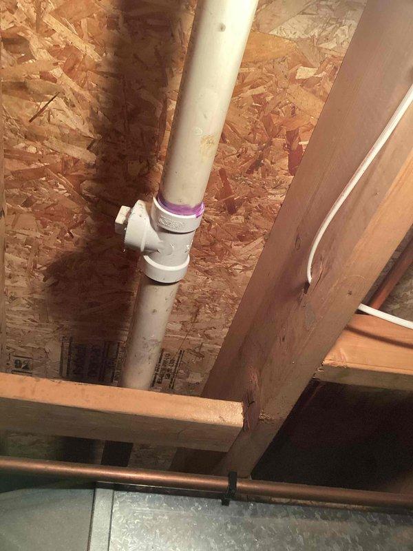 Responded to a drainage backup affecting the kitchen sink and half bathroom lavatory on a shared branch line. Attempted to clear the obstruction using a sink machine through two separate cleanout access points without success. Based on the persistent blockage and inability to clear from available access points, recommended specialized drain service for further diagnosis and clearing of the main drain line.