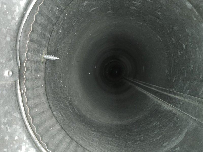 Performed comprehensive duct cleaning service in conjunction with recent HVAC installation. Removed accumulated dust and light debris from interior ductwork and ventilation passages, including corrugated metal supply ducts and wooden return air channels. Cleaned all accessible vents and registers to restore proper airflow and improve indoor air quality.