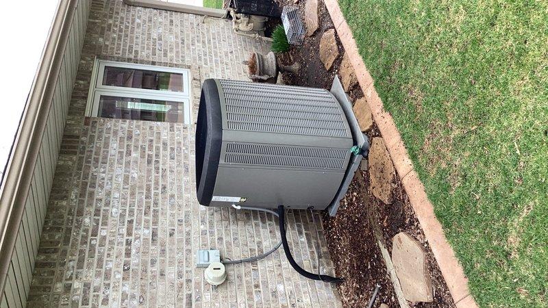Completed preventive maintenance agreement inspection on residential air conditioning system. Found capacitor reading slightly below manufacturer specifications and recommended replacement to prevent potential compressor failure. Documented outdoor condenser unit condition and electrical connections with photos.
