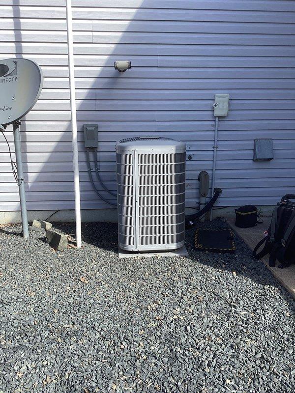 Responded to callback for no cooling condition. Upon arrival, verified thermostat settings and system operation. Found air conditioning system cycling properly with thermostat communicating correctly and calling for cooling at 69°F setpoint. System running normally with no faults detected. Advised to monitor performance and contact if issues recur.