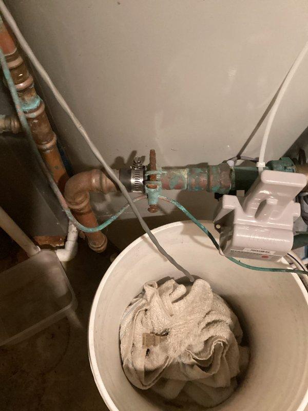 Responded to a water line leak at a residential property built in 1988. Upon arrival, located a pin hole leak on the copper water main immediately after the meter. Shut off water supply and cut out the damaged section of copper pipe and compromised fittings. Installed new copper pipe and fittings using proper soldering techniques to ensure a watertight seal. Restored water service to the home and verified all connections were secure with no additional leaks. System tested successfully with full water pressure restored to the residence.