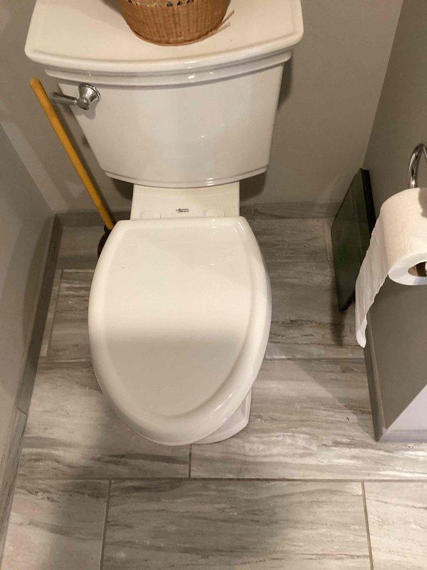 Responded to callback for master bathroom toilet that continued running after previous day's repair. Upon inspection, identified warped flapper valve causing slow water leak into bowl. Removed defective flapper and installed new replacement unit. Performed dye test to verify complete seal and confirm no additional leaks present. Toilet now functioning properly with no water waste.