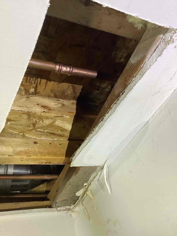 Responded to a leaking outdoor hose bibb that had burst and was causing water intrusion into the home. Created ceiling access to reach the failed fixture, removed the damaged hose bibb, and installed a new replacement unit. Restored water service to the property and verified all systems were functioning properly with no leaks present.