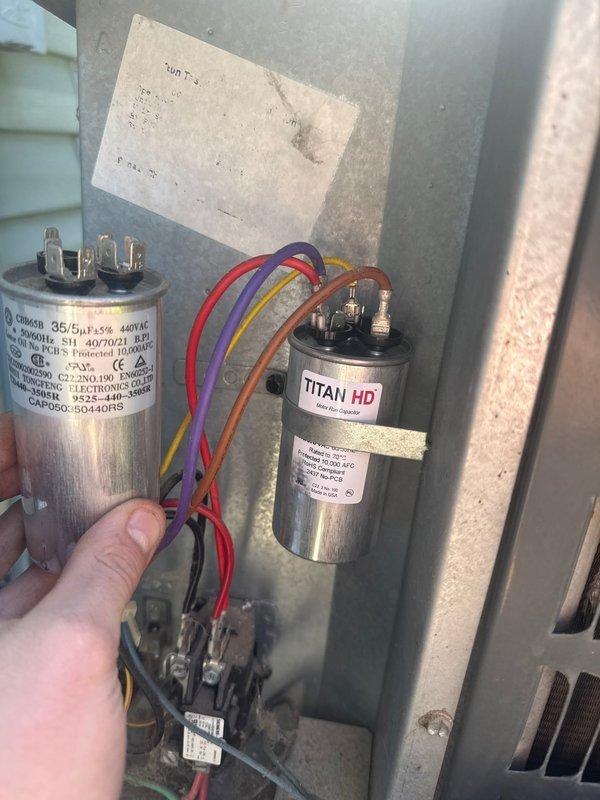 Responded to no cooling complaint on residential air conditioning system. Upon arrival, confirmed outdoor fan motor operating but indoor blower not running. Diagnosed failed dual run capacitor causing indoor blower failure. Replaced defective capacitor with new TITAN HD unit, restored system operation, and verified proper cooling performance by measuring supply and return air temperature differential.