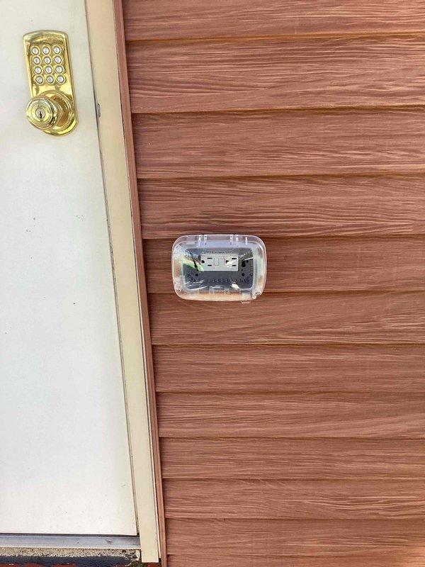 Responded to service call for Square D circuit breaker that would not reset following storm activity. Diagnosed breaker tripping issue and identified direct short in one of the existing outlets on the circuit. Replaced three defective outlets and installed weatherproof outdoor covers on exterior receptacles to provide proper protection from the elements.