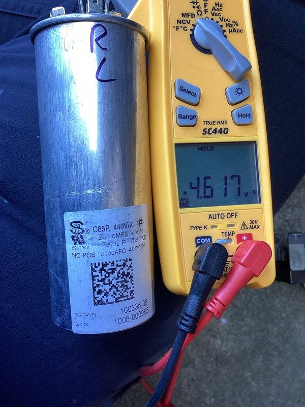 Completed preventive maintenance agreement inspection on Lennox air conditioning system. During routine testing, identified failed capacitor with degraded capacitance reading of 46.17 µF on C65A 440VAC rated component. Replaced defective capacitor with new unit to restore proper compressor and fan motor operation, ensuring system reliability and preventing potential equipment failure.