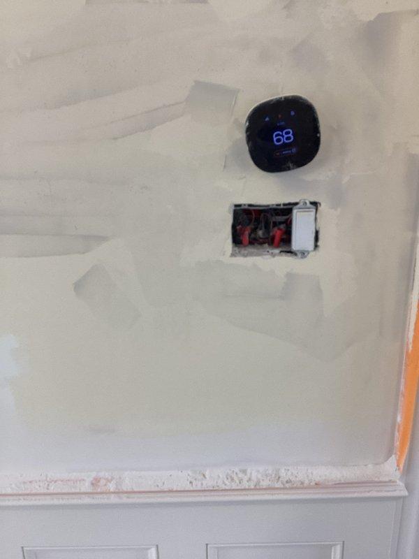Responded to service call for non-functioning electrical outlets and Ethernet ports throughout the residence. Diagnosed faulty circuit breaker that would not reset properly. Removed defective breaker from electrical panel and installed new replacement breaker to restore power to affected circuits.