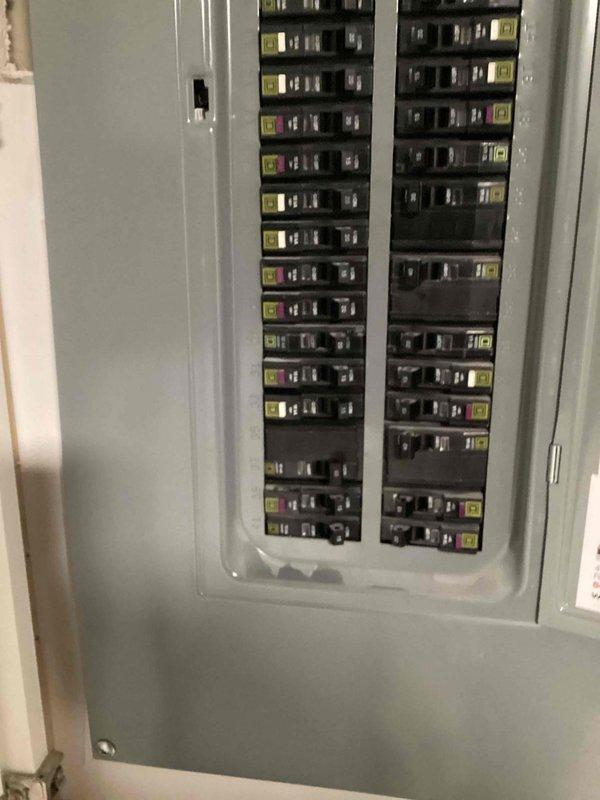 Responded to service call for non-functioning electrical outlets and Ethernet ports throughout the residence. Diagnosed faulty circuit breaker that would not reset properly. Removed defective breaker from electrical panel and installed new replacement breaker to restore power to affected circuits.