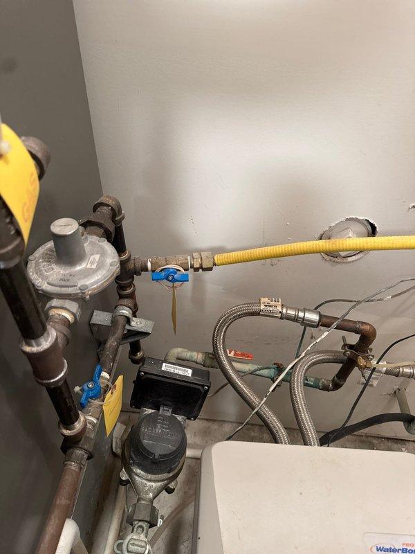 Responded to service call for leaking water heater. Upon arrival, confirmed active leak from tank requiring full unit replacement. Removed existing failed water heater and installed new A.O. Smith ProMax tanked water heater. Connected copper water supply lines, installed new flexible gas line with shut-off valve, and properly vented unit with metallic flue pipe. Tested all connections for leaks, verified proper gas flow and combustion, and ensured system operational before departure.