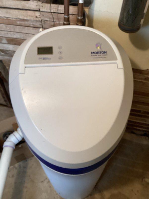 Responded to service call for non-functioning Morton water softener system. Upon inspection, diagnosed control board failure preventing unit operation. Provided customer with replacement estimate and documented equipment condition with photographs.