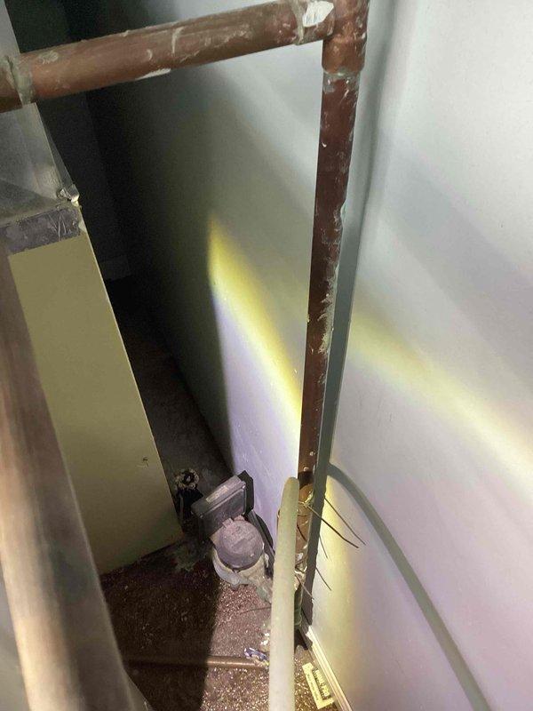 Responded to a leaking water main shut-off valve located in the mechanical room prior to the water meter. Upon inspection, found the main shut-off valve exhibited severe corrosion and deterioration with active leaking. Documented the condition with photographs showing extensive rust and compromised valve integrity. Determined that the corroded shut-off valve is positioned on the city side of the meter, making it the responsibility of the municipal water department (RPU) for repair or replacement. Advised customer to contact RPU water department directly to schedule necessary repairs to the city-owned infrastructure.