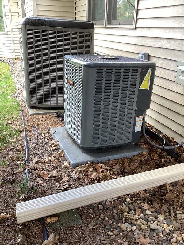 Performed routine maintenance on residential air conditioning system including two outdoor condensing units and indoor air handler. Inspected Goodman equipment for proper operation, checked refrigerant levels, cleaned components, and verified all mechanical and electrical connections. System operating within normal parameters upon completion of maintenance procedures.