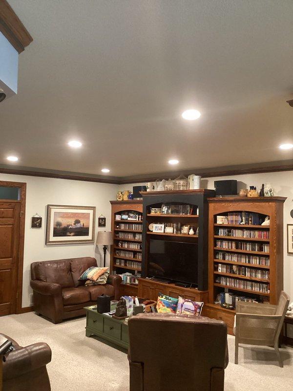 Removed 10 existing recessed can lights from the kitchen and living room areas and replaced them with new 6-inch LED wafer lights per the approved bid specifications. All fixtures were installed, tested, and confirmed operational upon completion.