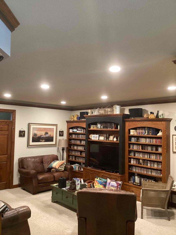 Removed 10 existing recessed can lights from the kitchen and living room areas and replaced them with new 6-inch LED wafer lights per the approved bid specifications. All fixtures were installed, tested, and confirmed operational upon completion.