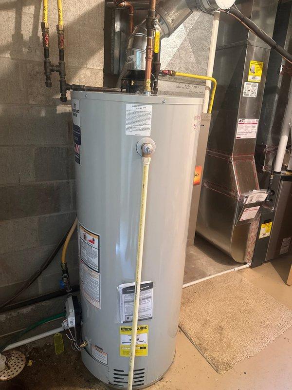 Completed full replacement of existing water heater with new 50-gallon Bradford White atmospheric vent natural gas unit. Drained and removed old water heater from premises. Installed new unit with proper venting connections, made all necessary water and gas line connections per manufacturer specifications, and filled tank. Performed startup procedure, lit pilot, verified proper combustion, and tested all connections for leaks. System operating at optimal performance with no leaks detected.