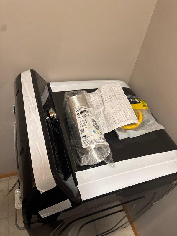 Completed gas dryer hookup installation using flexible gas line connector. Performed pressure test to verify system integrity and confirm no gas leaks at connection points, ensuring safe operation of the appliance.