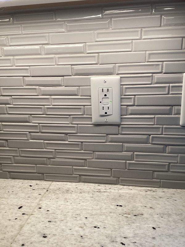 Responded to service call for kitchen GFCI outlet that was repeatedly tripping and replacement of outdoor lighting fixtures. Installed new GFCI receptacle in kitchen backsplash area to resolve tripping issue, ensuring proper ground fault protection for the circuit. Installed three customer-supplied exterior light fixtures to replace existing outdoor lighting. Verified all installations for proper operation and code compliance. Tested GFCI functionality using test and reset buttons to confirm proper ground fault protection.