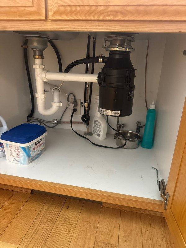 Responded to service call for non-functioning garbage disposal unit. Upon inspection, determined the disposal was jammed and inoperable. Successfully cleared the jam and restored the unit to proper working condition, verifying full functionality before completing the service.