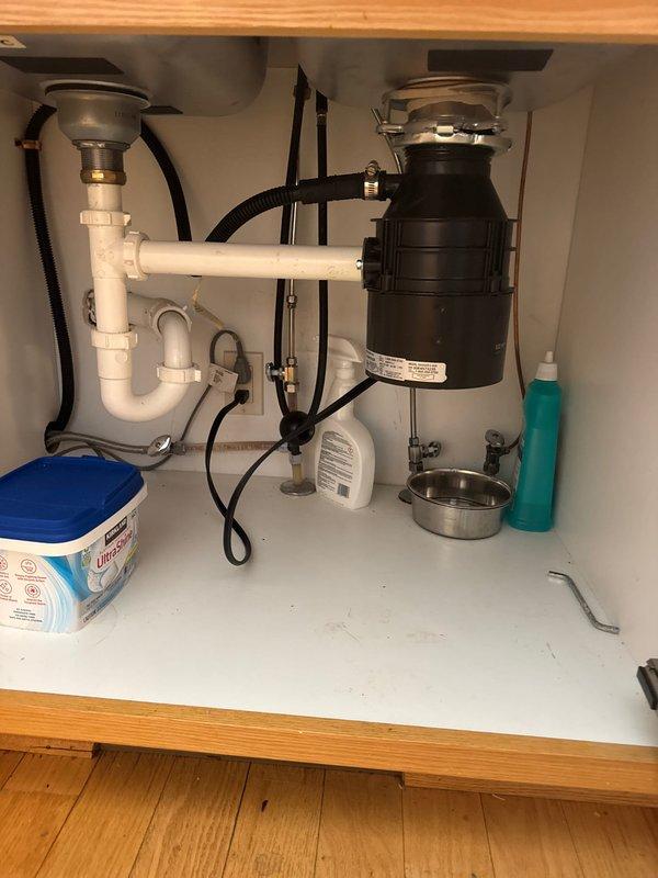 Responded to service call for non-functioning garbage disposal unit. Upon inspection, determined the disposal was jammed and inoperable. Successfully cleared the jam and restored the unit to proper working condition, verifying full functionality before completing the service.