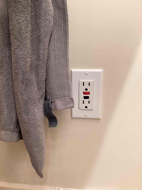 Completed comprehensive FRM electrical inspection verifying all safety systems and code compliance. Confirmed GFCI protection installed at required locations throughout the property, including bathroom receptacles. Verified proper bonding of gas and water lines to electrical system per code requirements.