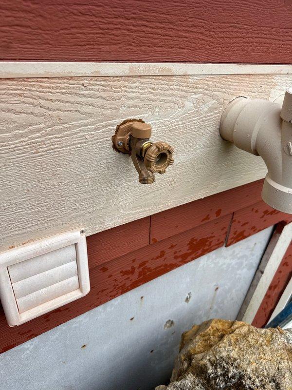 Responded to service call for leaking hose bib on exterior of building. Upon arrival, identified freeze break damage to outdoor faucet. Replaced damaged hose bib with new brass fixture and verified proper operation with no leaks detected upon completion.