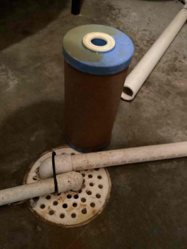 Responded to service call for low water pressure affecting entire home. Upon inspection, identified whole house water filter as source of issue. Filter was severely clogged with sediment and debris, having not been serviced in over a year. Removed old filter cartridge and installed new replacement filter. Tested system after installation and confirmed full water pressure restoration throughout the residence.