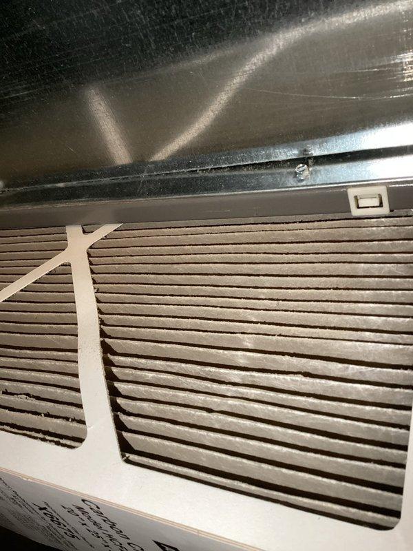 Responded to no heat call. Upon arrival, found furnace inoperative. Inspection revealed gas valve in OFF position and severely restricted airflow due to heavily soiled air filter. Restored gas supply by turning valve to ON position and replaced dirty filter with new unit. Verified system operation and restored heat to building.