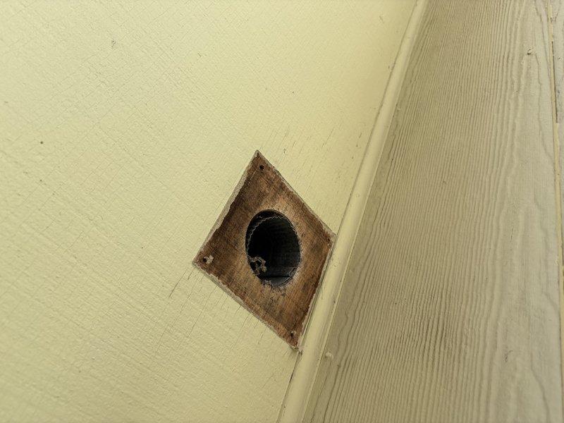 Arrived on-site at 10:00 AM to investigate bathroom exhaust fan venting concerns. Coordinated with realtor to gain property access. Located bathroom exhaust fan duct routing, which was concealed beneath attic insulation. Traced ventilation pathway from interior termination point through attic space to roof penetration. Inspected ductwork condition, connections, and proper venting configuration. Documented findings with photographs showing interior wall termination and attic duct installation.