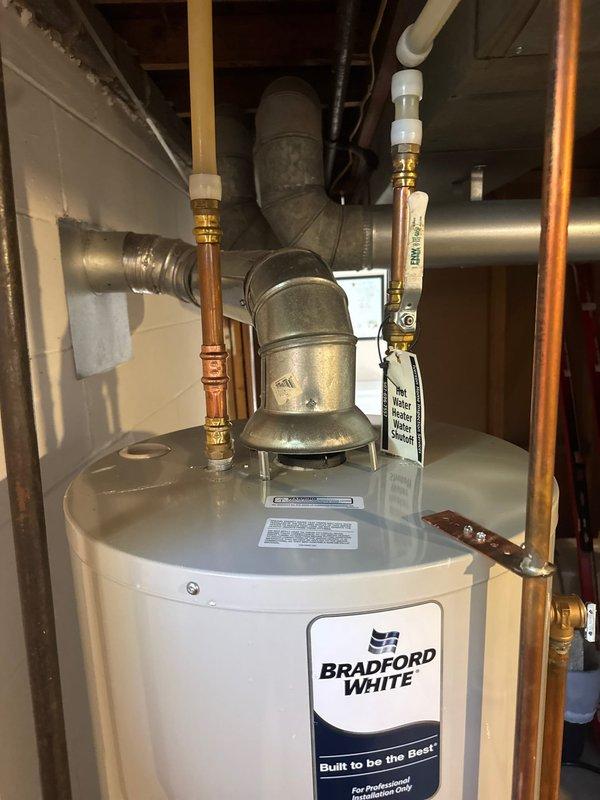 Responded to service call for non-functional water heater. Upon assessment, determined existing unit was beyond economical repair and recommended replacement. Successfully installed new 40-gallon Bradford White tanked water heater in basement utility room. Installation included proper copper piping connections, expansion tank integration, brass ball valves with shutoff capability, PVC pressure relief drain line, and all required safety components per manufacturer specifications and local plumbing codes. Tested system for proper operation, verified all connections for leaks, and ensured adequate venting. Unit operational and performing to specifications upon completion.