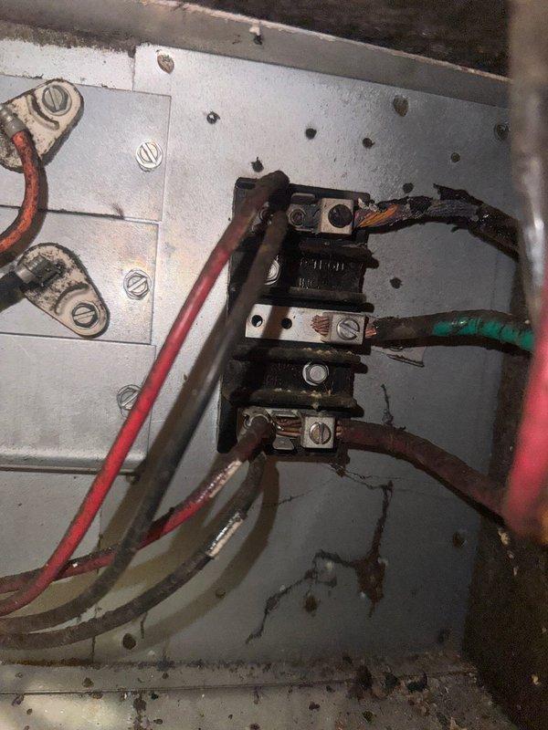 Responded to service call for geothermal system emitting odor during operation. Upon inspection, identified source as 30-year-old fan coil unit with severely deteriorated electrical wiring showing burn marks and exposed conductors, along with heavily corroded drain pan causing water leakage into return air plenum. Due to safety hazards and extent of deterioration, de-energized fan coil unit at breaker and documented conditions with photographs. Coordinated with project management team to schedule equipment replacement estimate.