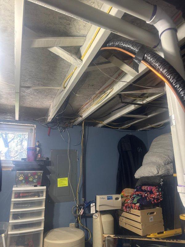 Responded to service call for leaking tanked water heater. Upon arrival, inspected the unit and confirmed active leak originating from the tank itself, which is not repairable. Provided estimate for complete water heater replacement with new Reliance 606 model unit. Replaced the failed water heater with new tanked unit, including all necessary connections to existing copper supply lines and PVC drain piping. Installed proper fittings and transition connections at top of unit, ensuring secure water inlet and outlet connections with shut-off valve access for future maintenance.