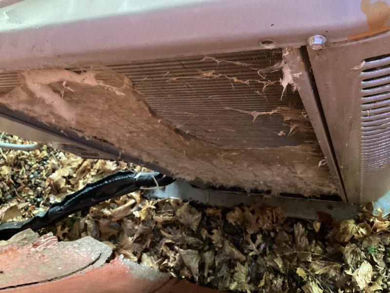 Completed preventative maintenance on air conditioning system. Replaced dirty air filter and thoroughly cleaned heavily soiled outdoor condenser coil that had significant debris accumulation including leaves and dirt buildup affecting heat transfer efficiency.