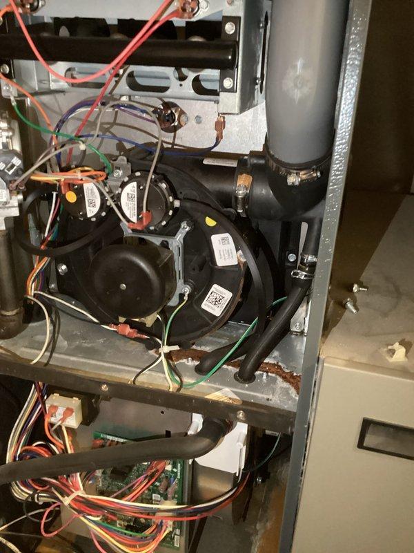 Responded to service call for furnace with condensation accumulation and exposed wiring on AC unit. Performed comprehensive inspection of HVAC system, identified and corrected safety hazards including exposed electrical connections, secured all wiring harnesses, and addressed condensation issue. Tested system operation to verify proper functionality and safe conditions upon completion.