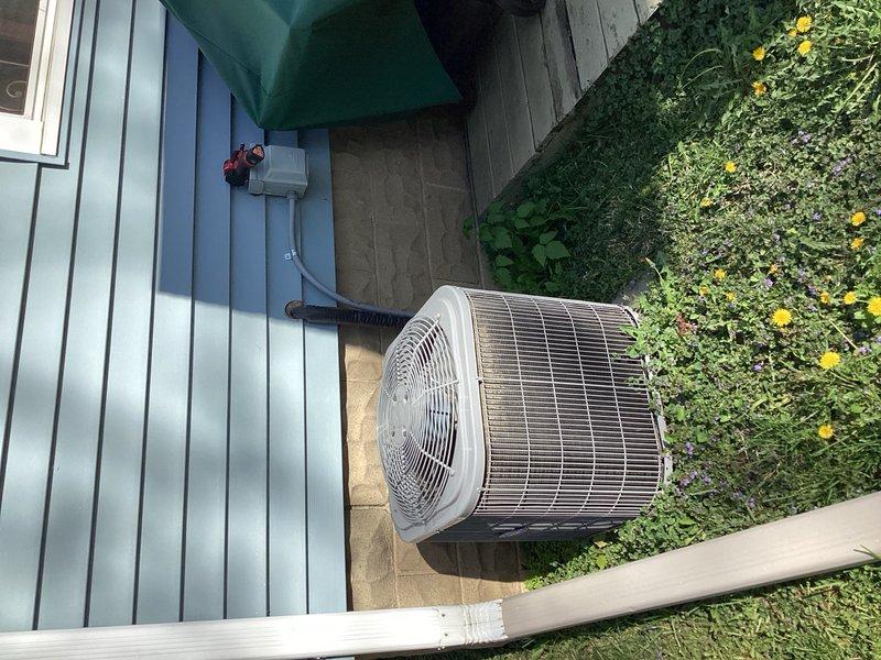 Responded to no-cooling call on residential air conditioning system. Upon arrival, confirmed outdoor condensing unit was not operating. Diagnostic testing revealed failed run capacitor preventing compressor and condenser fan motor from starting. Replaced defective capacitor with proper replacement unit, restored power, and verified system operation. Unit cooling properly at time of departure.