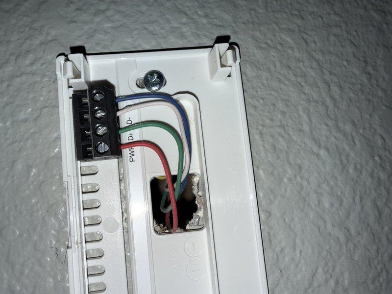 Responded to communication failure between satellite thermostats and HVAC system where upstairs zones lost heating/cooling functionality while main level remained operational. Diagnosed wiring communication issue preventing system from recognizing upstairs and downstairs thermostats. Performed system reset which restored full communication and operation to all zones. Recommended upgrading existing 4-wire connection to S40 controller with two separate 18-2 thermostat wire runs to prevent voltage drop and improve signal reliability.