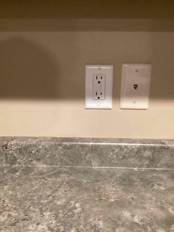 Responded to service call for refrigerator circuit overload issue where GFCI outlet was repeatedly tripping. Diagnosed faulty GFCI receptacle as the root cause and replaced it with new GFCI outlet to restore proper circuit protection and functionality for the refrigerator.