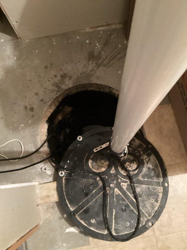 Responded to service call for malfunctioning sump pump reported to be making loud noises and not operating correctly. Upon inspection, identified debris lodged in the pump impeller that was causing the unit to jam and produce excessive noise during operation. Removed obstructing debris from impeller assembly, verified pump motor function, and tested complete pump cycle to ensure proper operation with no failures or abnormal sounds.