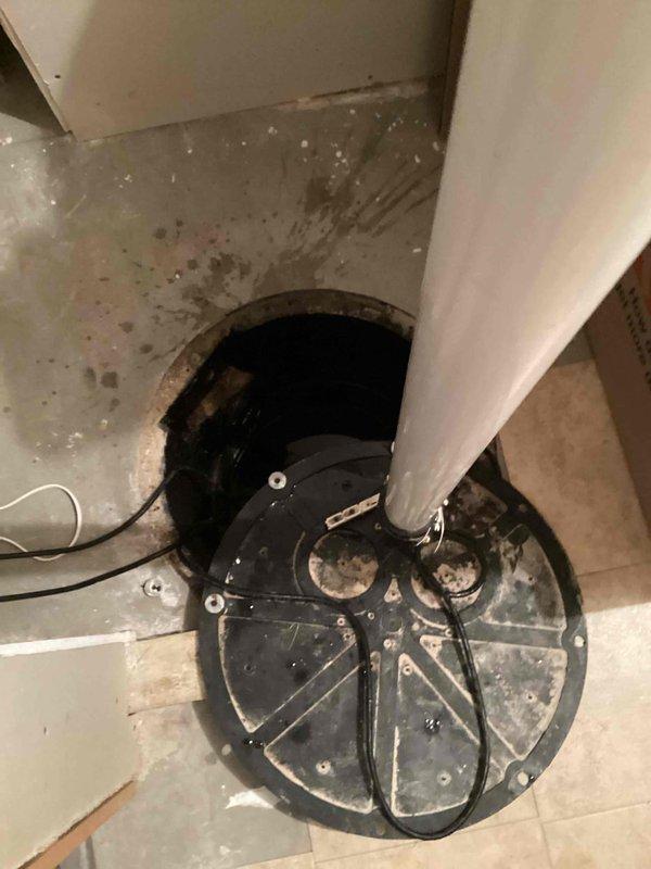 Responded to service call for malfunctioning sump pump reported to be making loud noises and not operating correctly. Upon inspection, identified debris lodged in the pump impeller that was causing the unit to jam and produce excessive noise during operation. Removed obstructing debris from impeller assembly, verified pump motor function, and tested complete pump cycle to ensure proper operation with no failures or abnormal sounds.