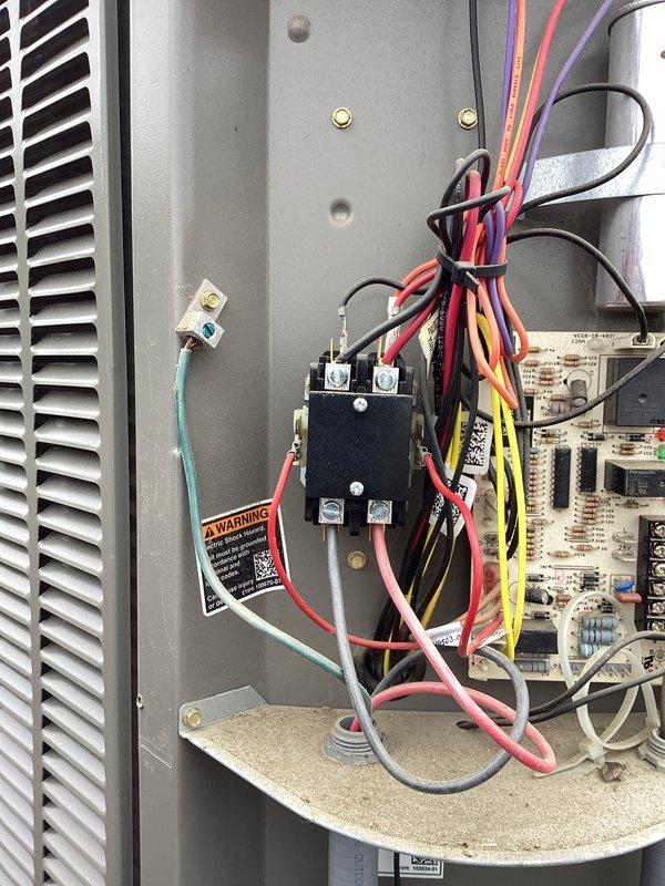 Responded to no cooling complaint on multi-unit heat pump system. Diagnosed unit #51 with failed condenser fan motor and starter capacitor, and unit #54 with failed contactor. Replaced fan motor, starter capacitor, and contactor on respective units, restoring full cooling operation to both heat pumps.