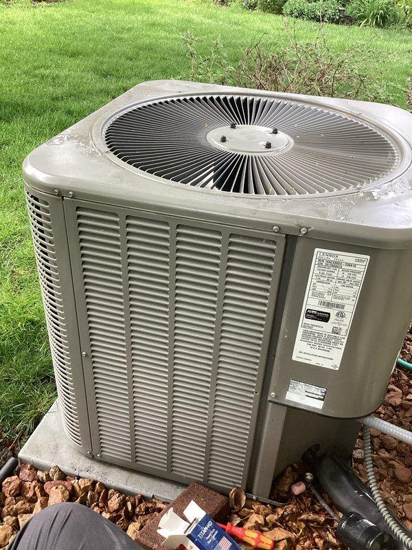 Performed preventive maintenance tune-up on residential air conditioning system. Upon inspection, identified failed capacitor preventing proper compressor operation. Replaced defective capacitor with new unit rated at 35/5 MFD, 370V, restoring system to full operational capacity.