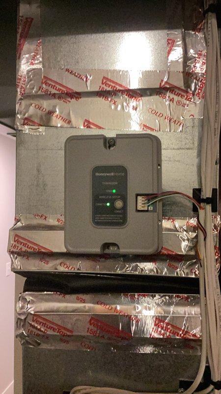 Responded to cooling complaint with insufficient airflow to upper level while lower level maintained adequate temperature. Diagnosed issue as improper thermostat configuration causing inadequate demand on main floor zone. Reconfigured thermostat settings and verified proper system operation with balanced cooling distribution between levels.