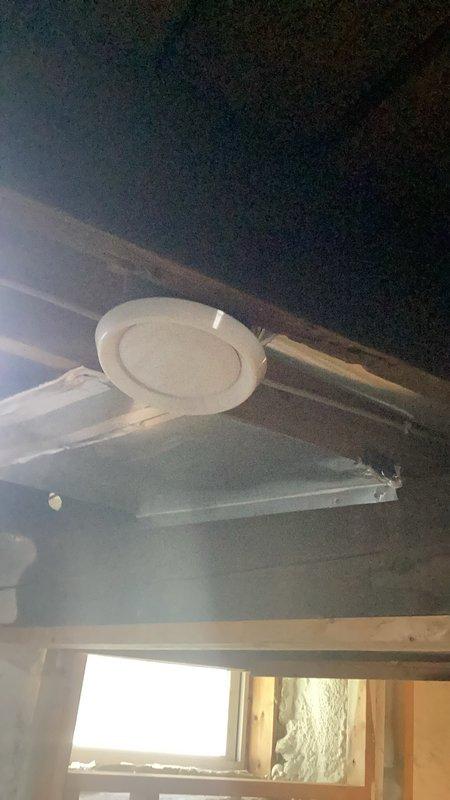 Responded to service call for non-operational humidifier and general HVAC inspection. Upon arrival, discovered zone system had been unplugged and identified significant ductwork modifications where the house had been converted from a multi-zone to single-zone system. Inspected metal ductwork in attic space, including galvanized sheet metal sections with elbow joints and flexible aluminum ducting connections. Documented existing duct configuration and conversion work for further evaluation. Referred case to estimating department for proper system assessment and recommendations to address the zone conversion and associated ductwork concerns.